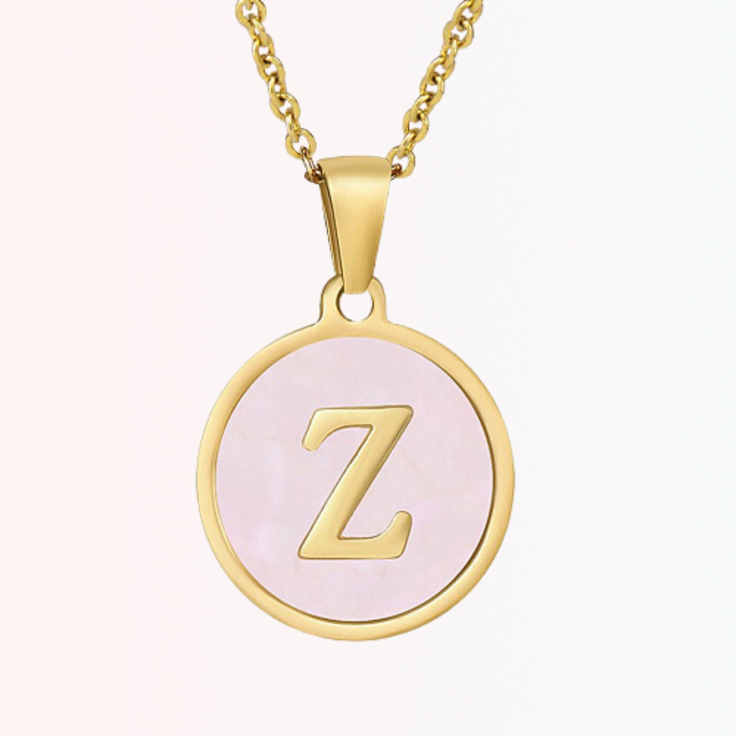 Collar con Charm de Inicial en Chapa Rosada en Stainless Steel Dorado 18K