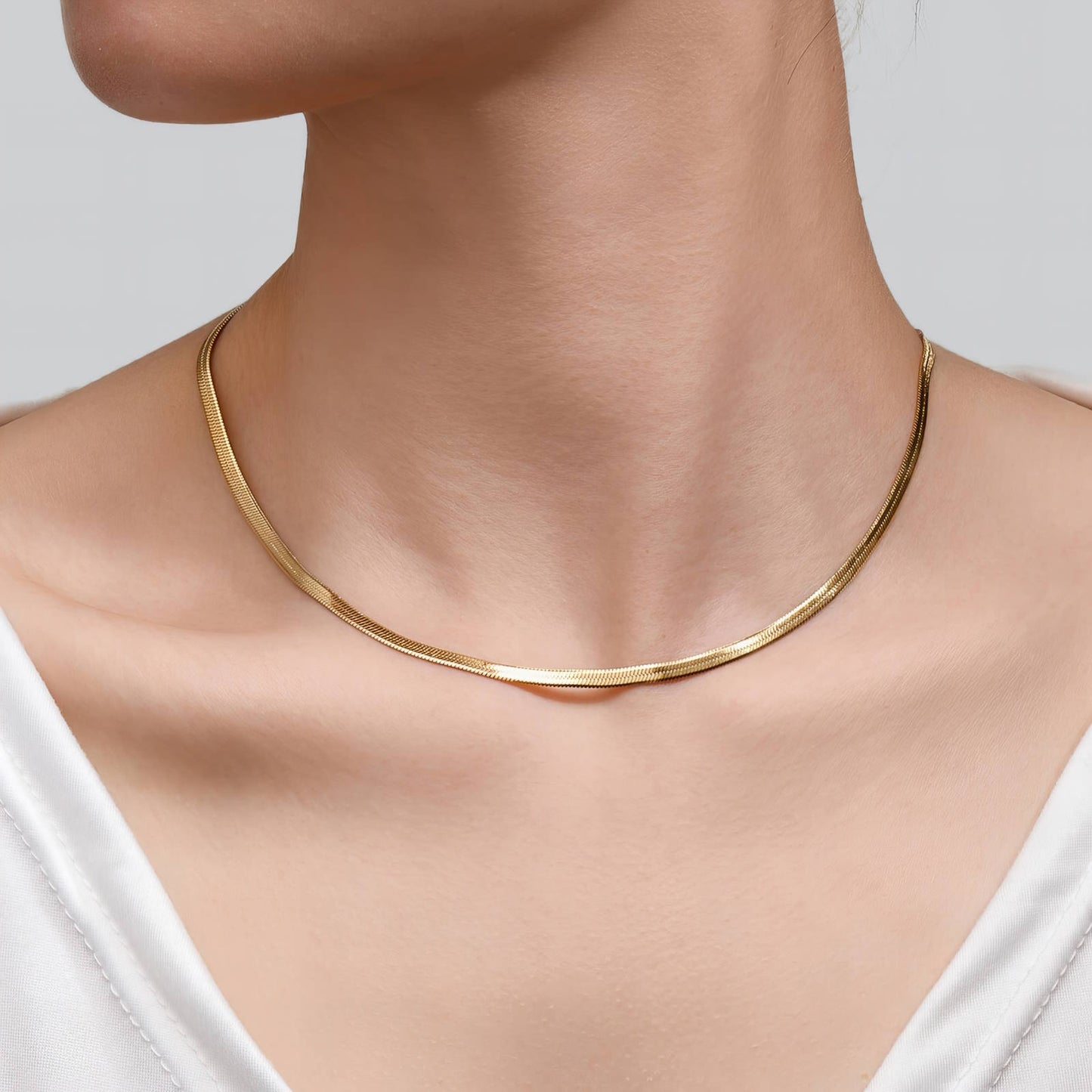 Cadena dorada flat en stainless steel con baño en oro 18k