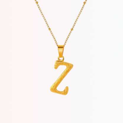 Collar con Inicial Minimalista en Stainless Steel Dorado 18K