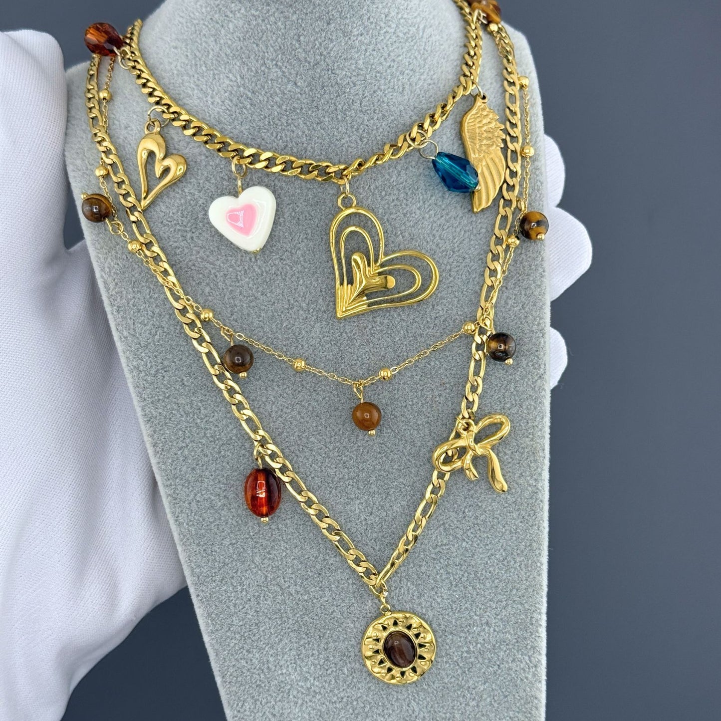 Collar de charms mixto con lazo Dorado y tonos brown (Stainless Steel)