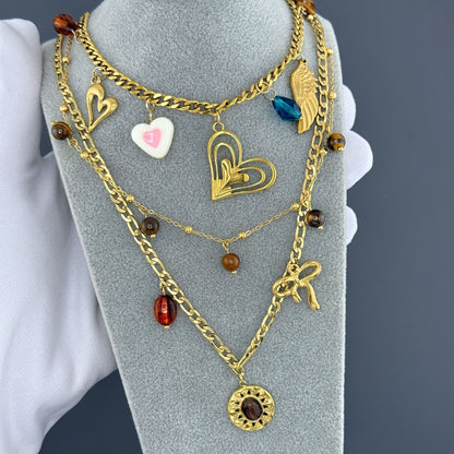 Collar de charms mixto con lazo Dorado y tonos brown (Stainless Steel)
