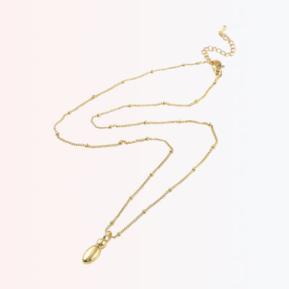 Collar con Charm de Letra en Brass Dorado 18K