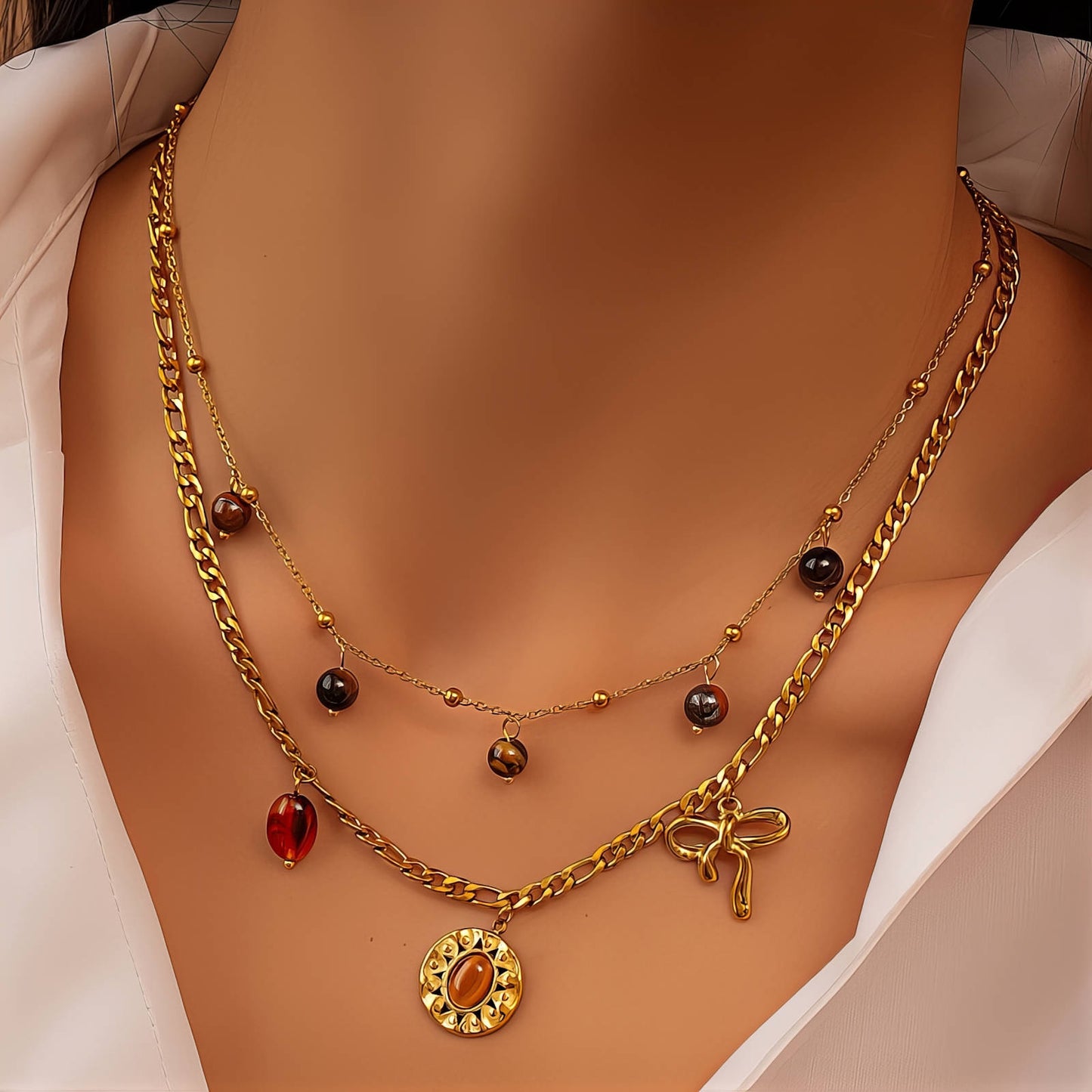 Collar de charms mixto con lazo Dorado y tonos brown (Stainless Steel)