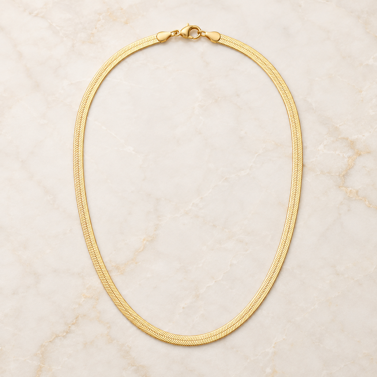 Cadena dorada flat en stainless steel con baño en oro 18k