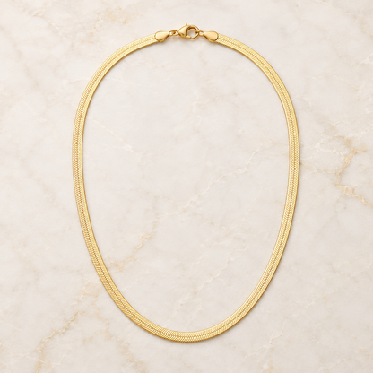 Cadena dorada flat en stainless steel con baño en oro 18k